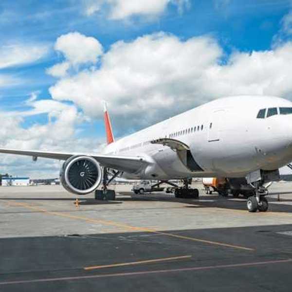 An airplane parked on the tarmac