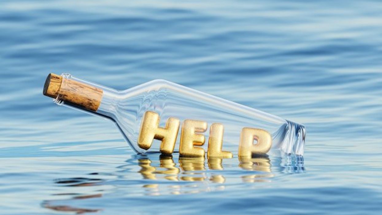 An illustration of a glass bottle floating in water with the word HELP inside of it.