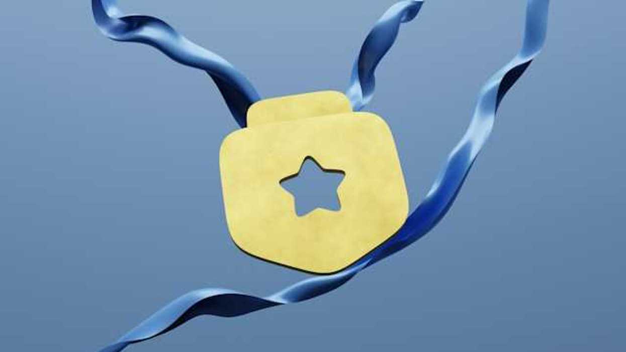 An illustration of a gold star medallion on a blue ribbon