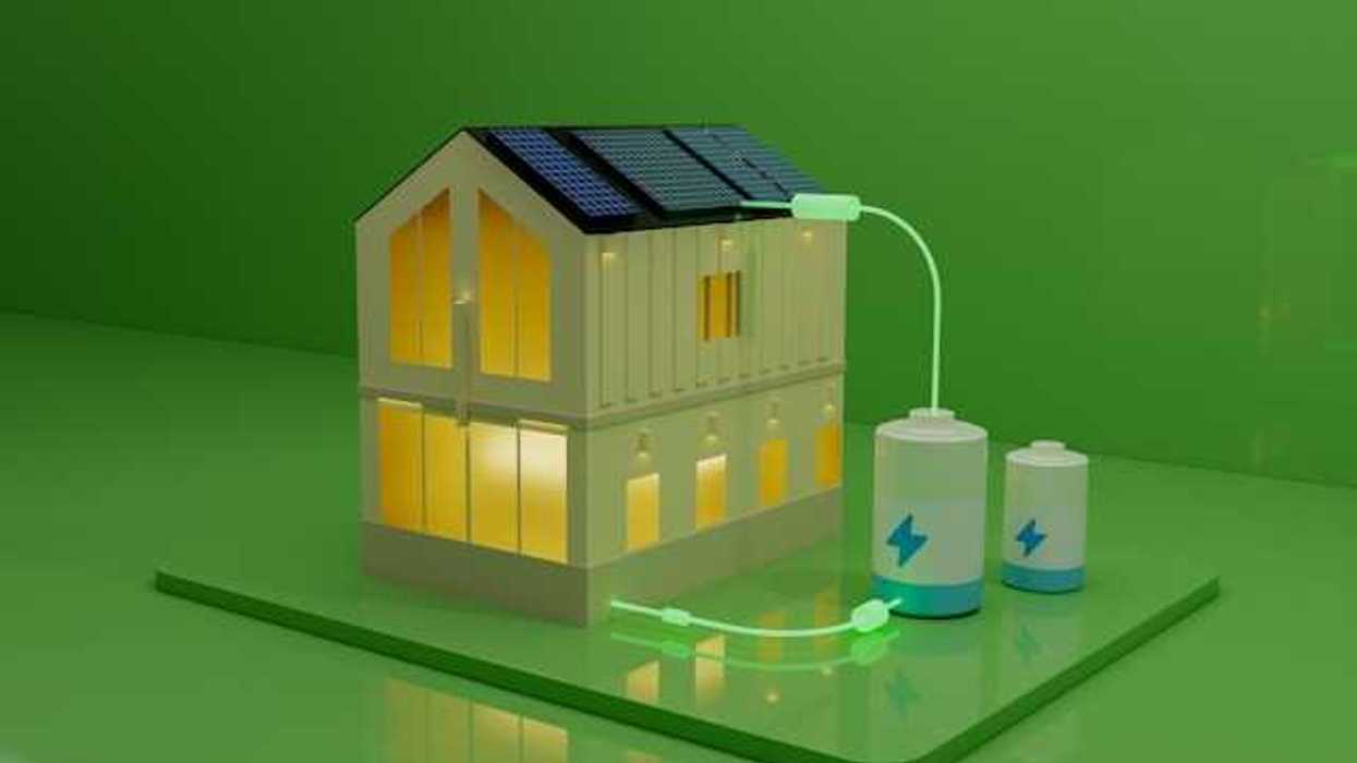An illustration of a house with batteries hooked up to rooftop solar panels