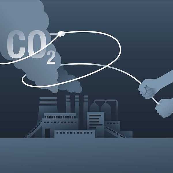 An illustration of a lasso catching harmful smoke coming from an industrial building