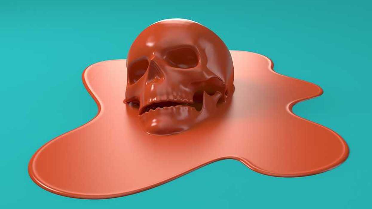 An illustration of a red skull melting into a teal background