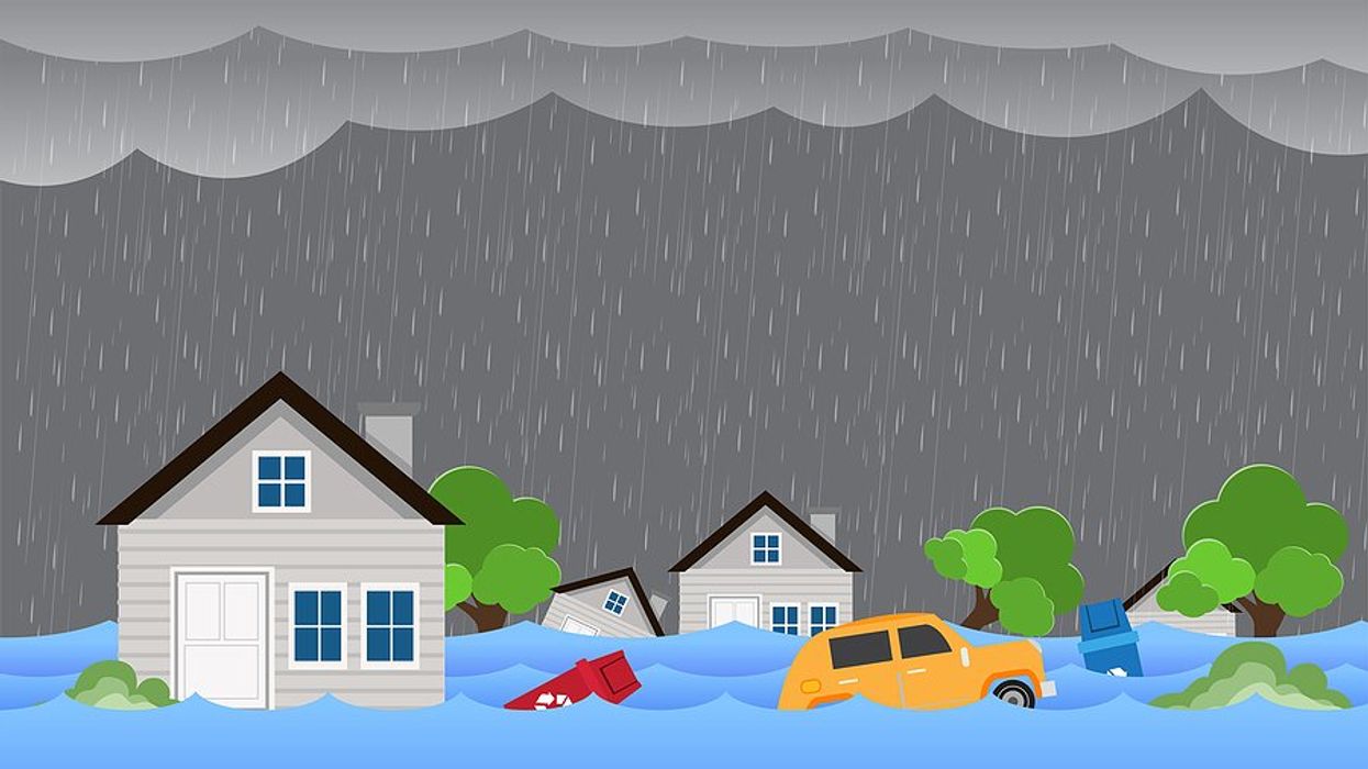 An illustration of houses and cars under flood waters during a rainstorm.