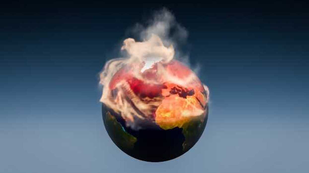 An illustration of planet Earth against a blue background with the top half on fire