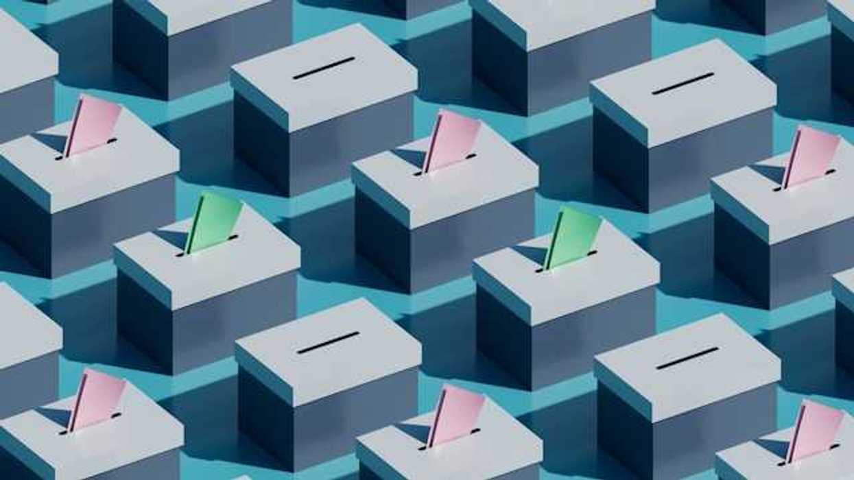 An illustration of poll boxes with voting slips sticking out of them