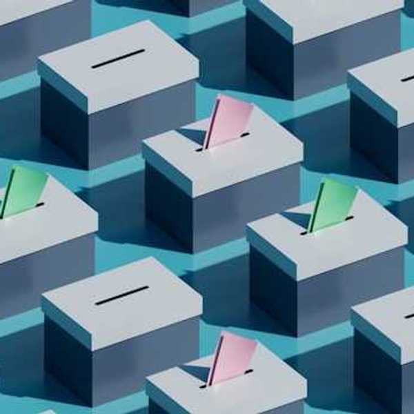 An illustration of poll boxes with voting slips sticking out of them