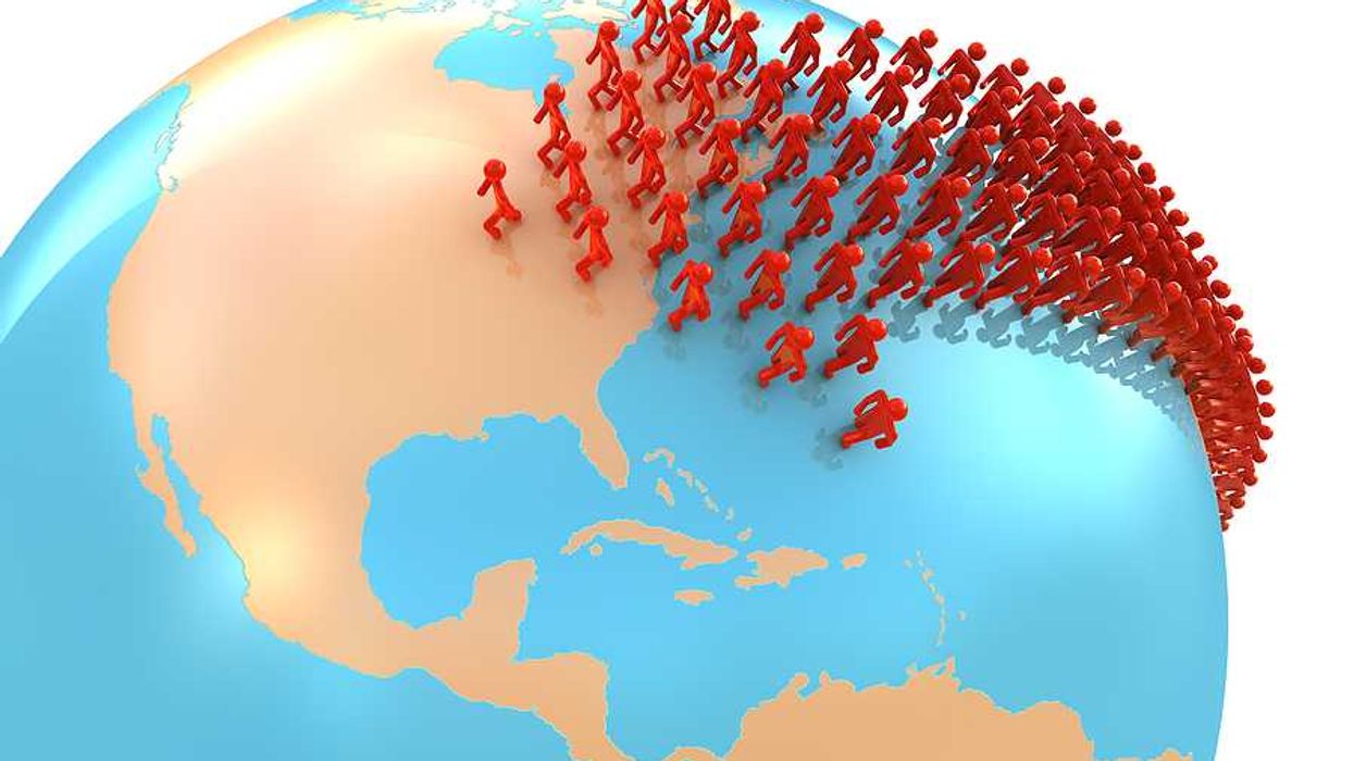 An illustration of the globe with people migrating toward the U.S.