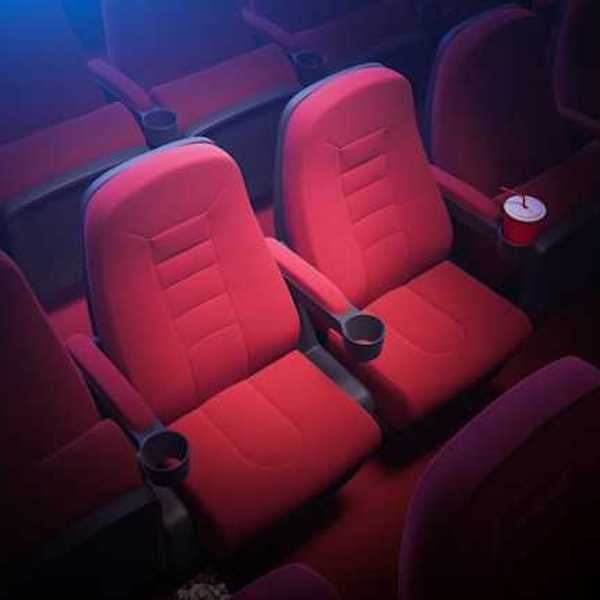 An illustration of two red movie theater seats