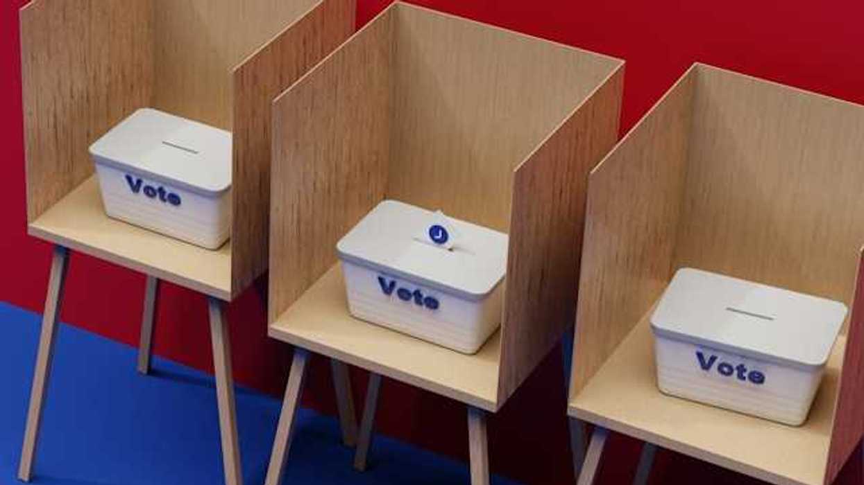 An illustration of voting booths with voting boxes in them