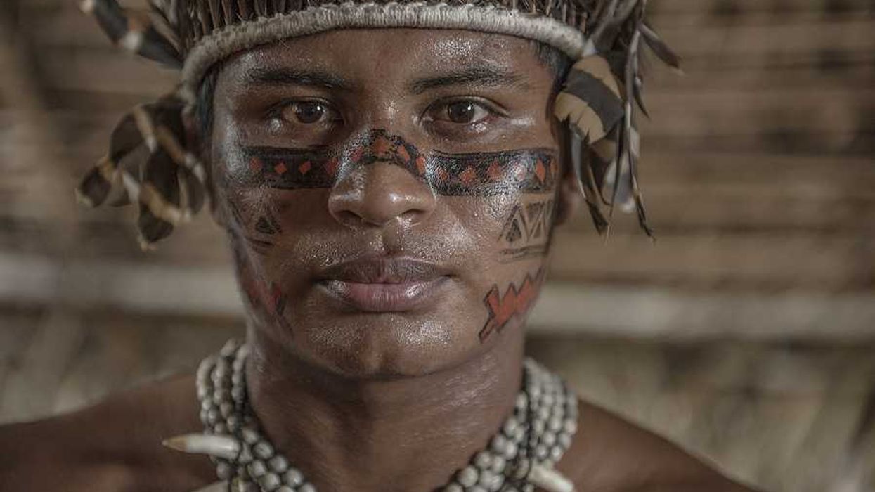 An indigenous Amazon man in native clothing