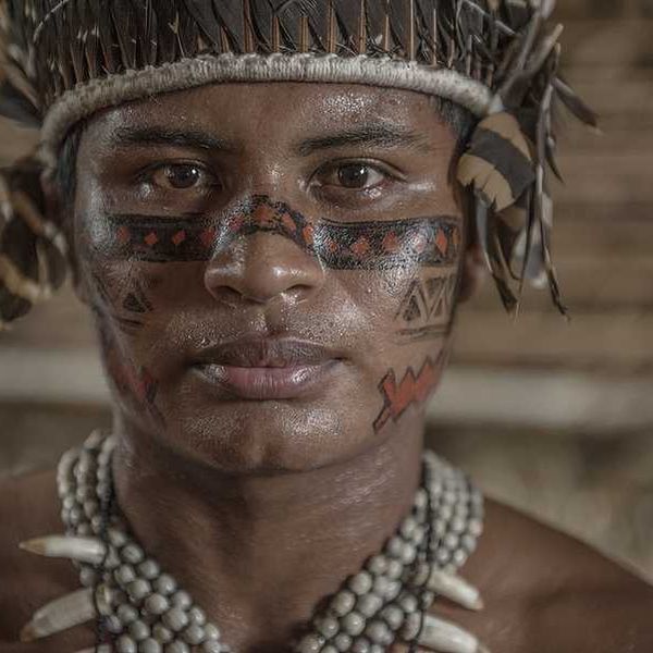 An indigenous Amazon man in native clothing