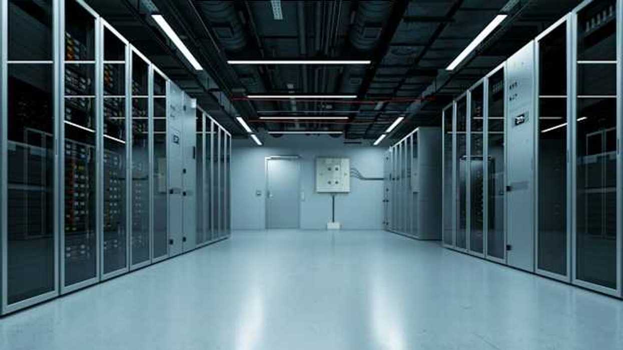 An interior of a data center with rows of servers