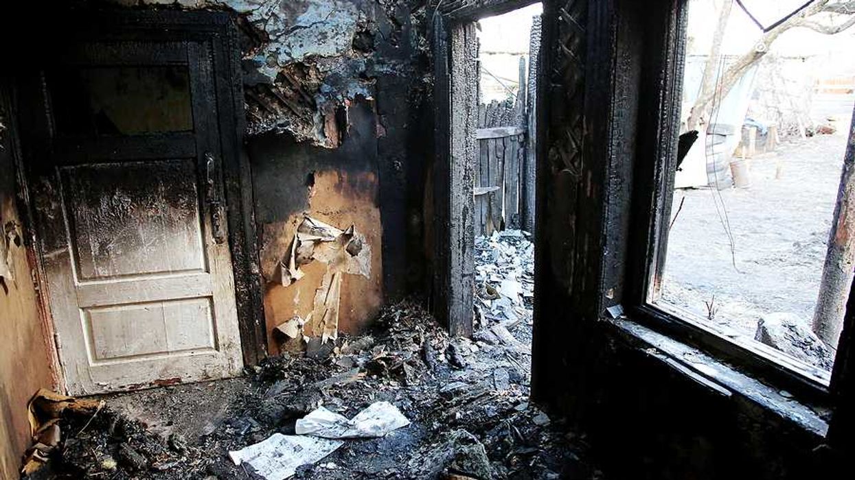 An interior photo of a burned home
