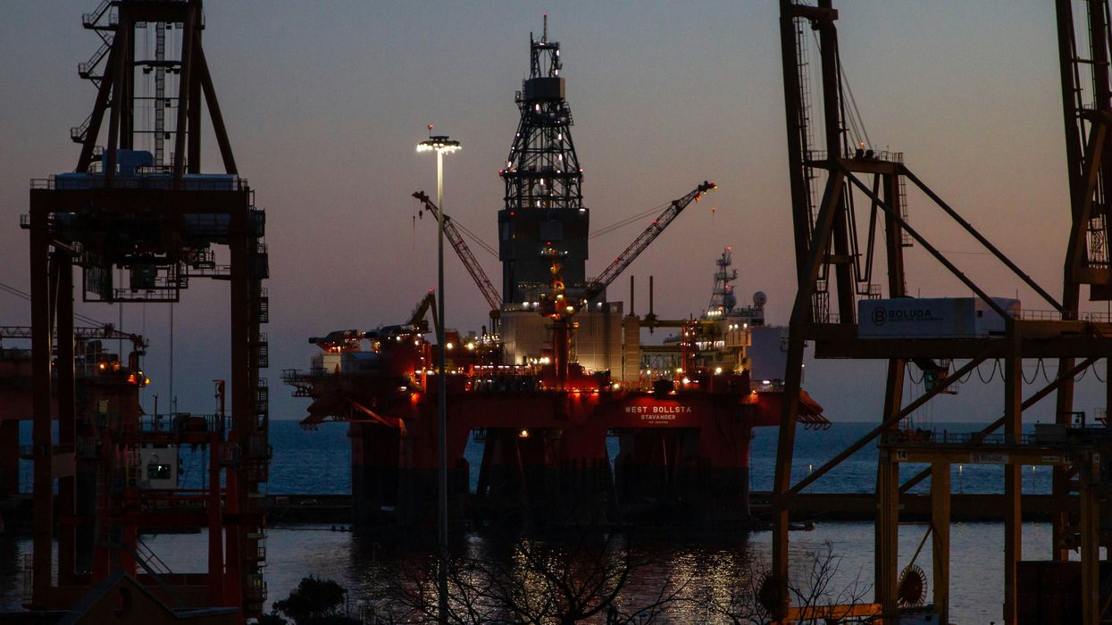 An oil rig at dusk