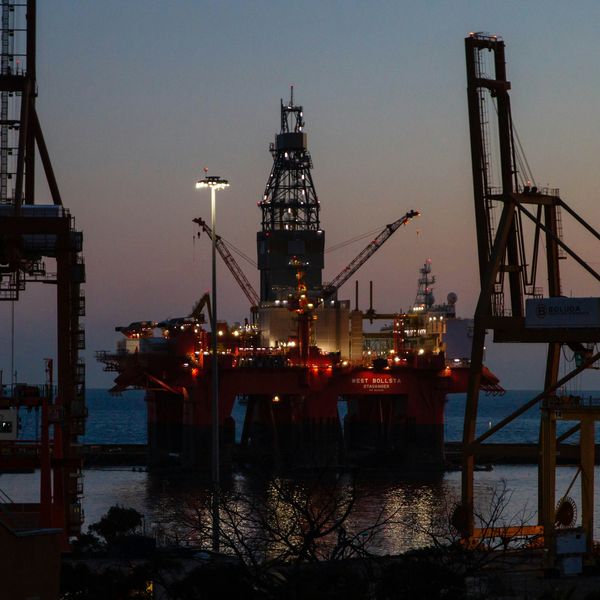 An oil rig at dusk