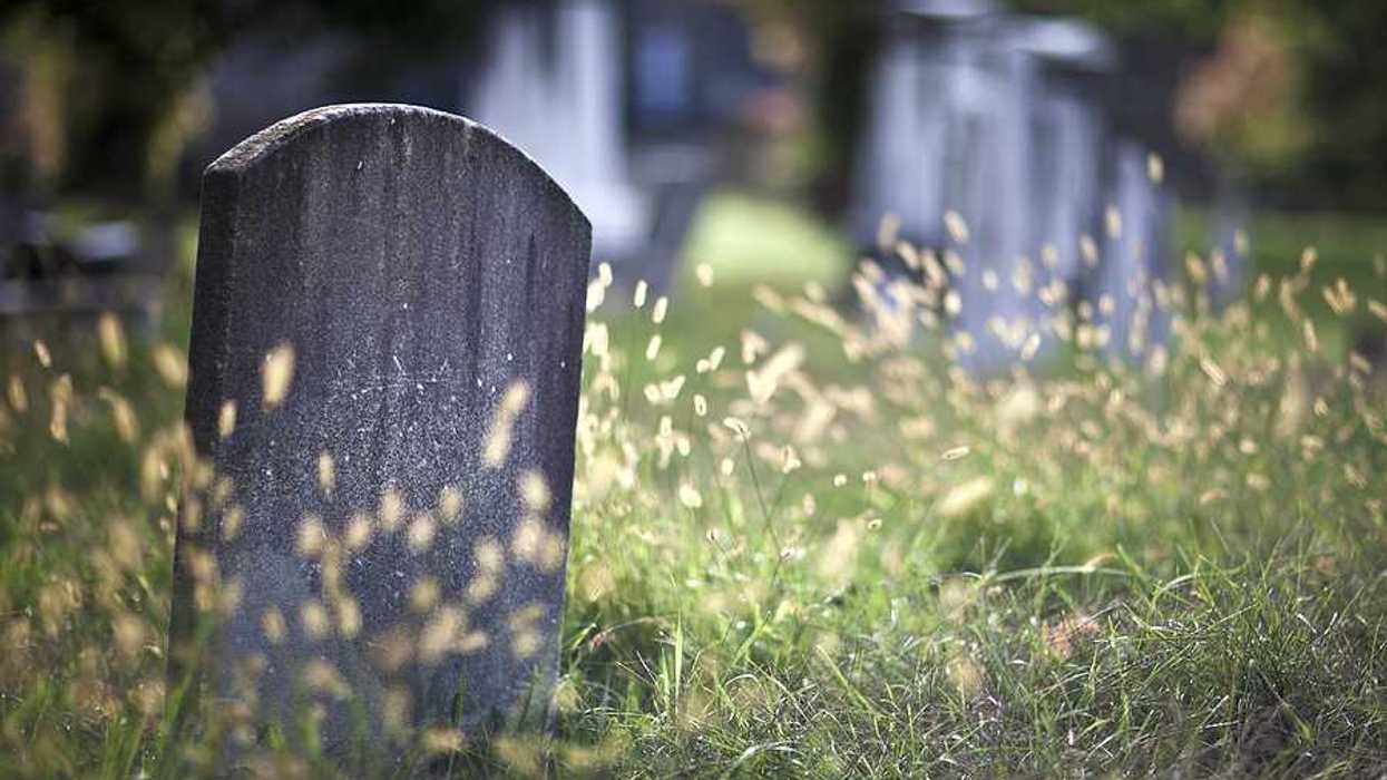 An old gravestone in an ancient cemetery