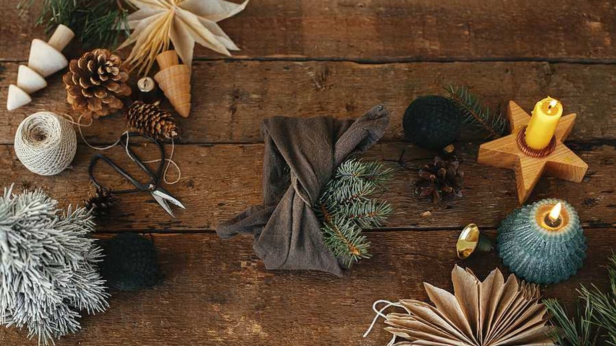 An overhead view of natural holiday wrapping and decorations