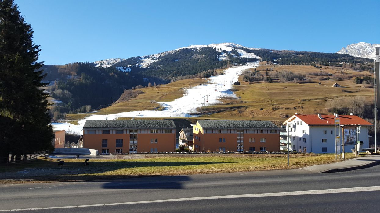 artificial snow alps buildings mountains