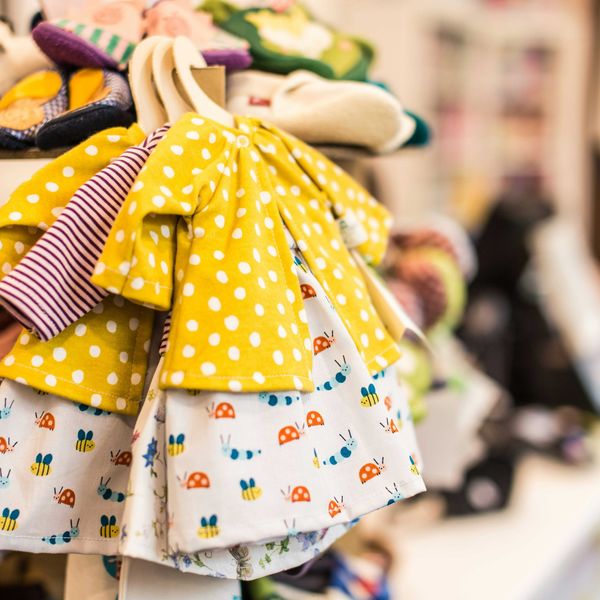 assorted-color long-sleeved baby dresses