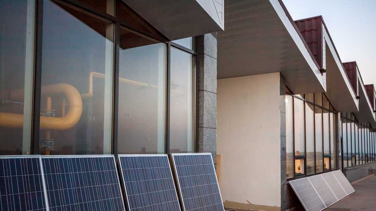 Balcony solar: solar panels on balcony of modern office building