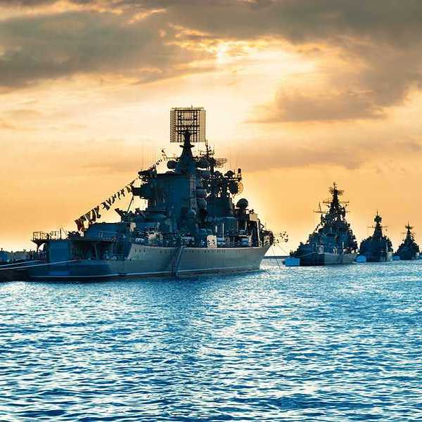 Battle ships heading into the sunset