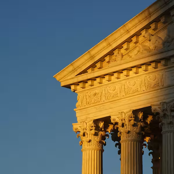 beige concrete building under blue sky during daytime