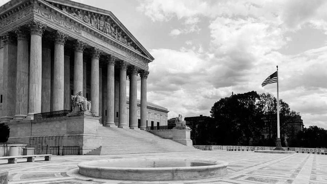 Black and white photo of the Supreme Court of the U.S.