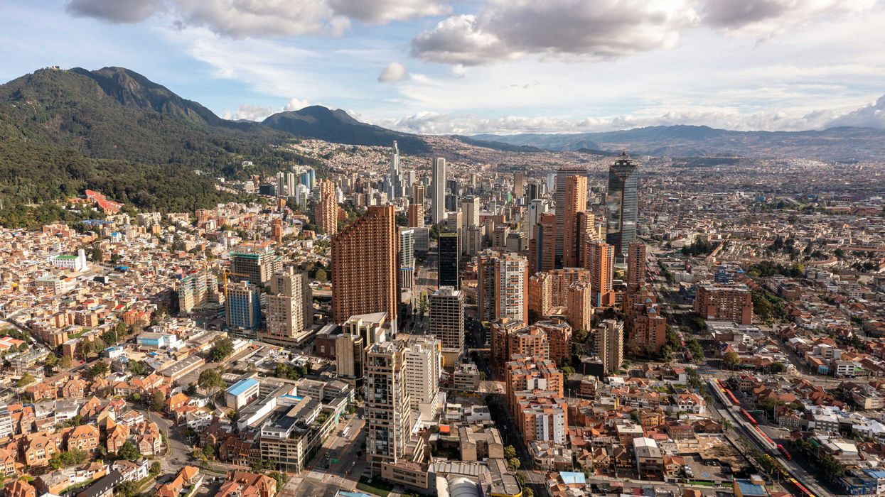Bogota Colombia buildings from above with mountains in background.