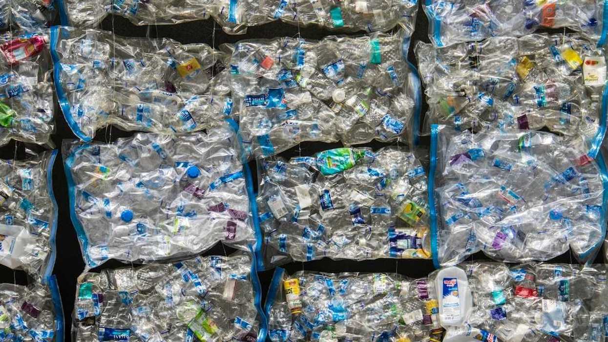 bundled plastic containers awaiting recycling, incineration, or another type of disposal