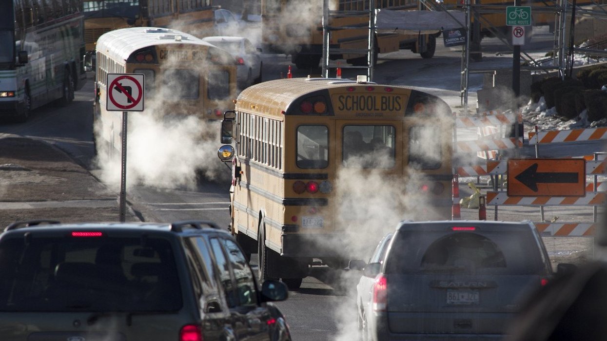 buses and cars in traffic