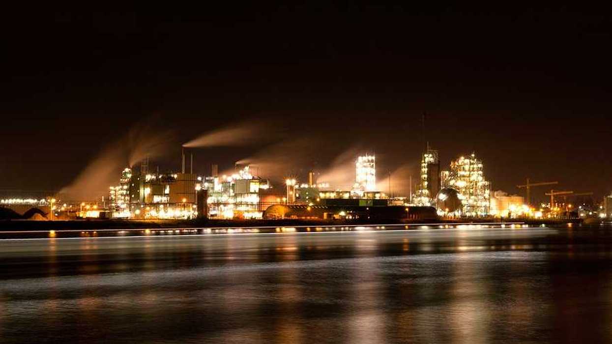 Chemours chemical factory in Dordrecht, Netherlands, as seen from the other side across the river Merwede