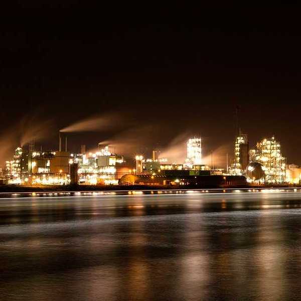 Chemours chemical factory in Dordrecht, Netherlands, as seen from the other side across the river Merwede