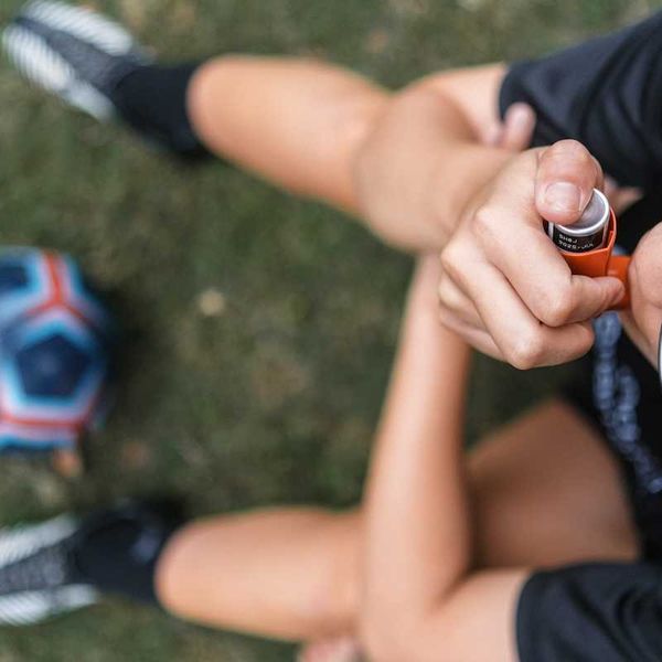 Child with asthma inhaler