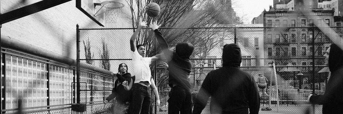 Children playing basketball in Brooklyn, NY