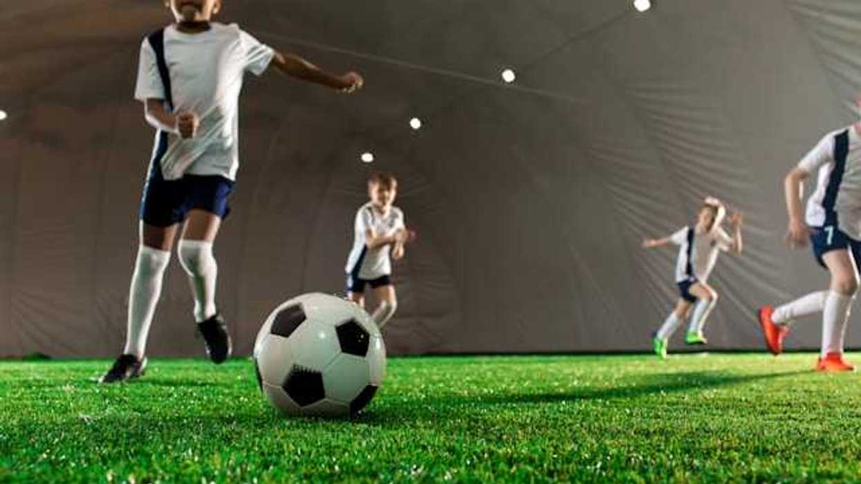 Children playing soccer