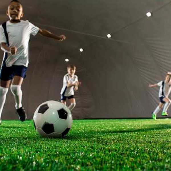 Children playing soccer