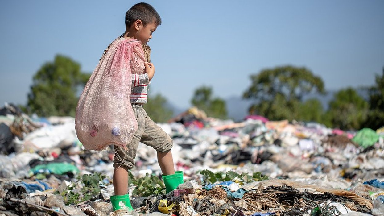 children walking on garbage