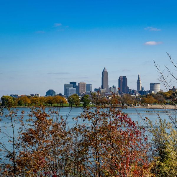 city skyline across body of water during daytime