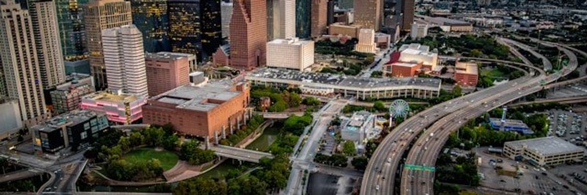 City skyline with freeways winding through downtown.