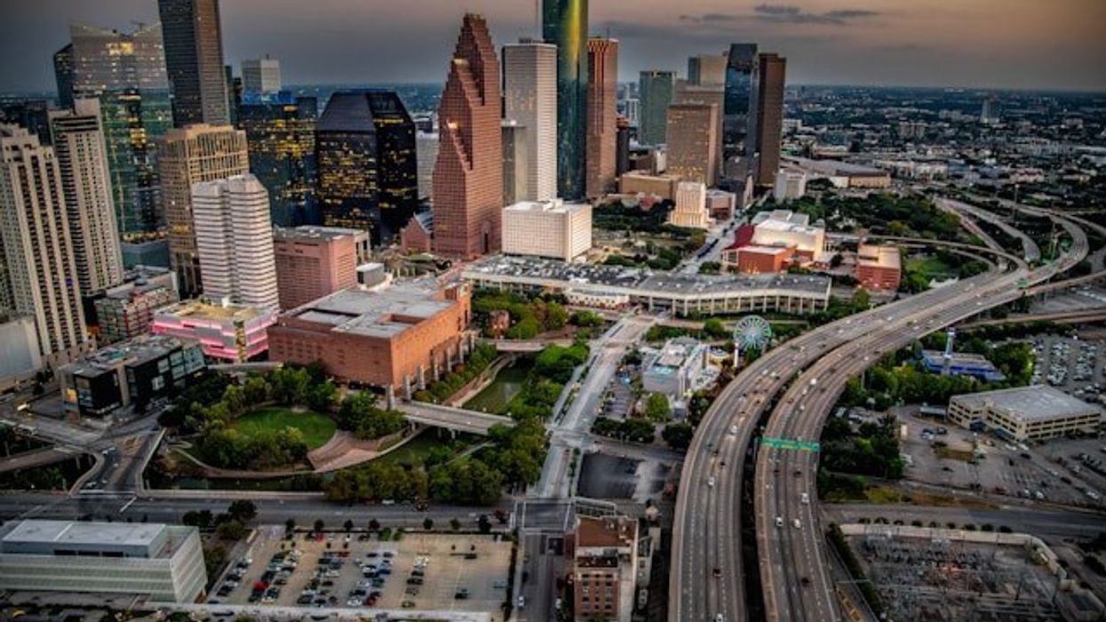 City skyline with freeways winding through downtown.