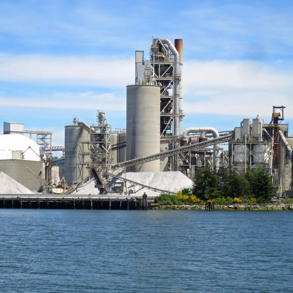 Clairton Coke works:  large factory building next to a body of water.