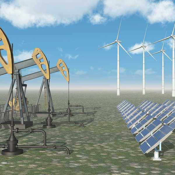 Computer generated 3D illustration with oil pumps, solar panels and wind turbines.