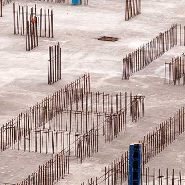 Construction of the foundation of a building with concrete and metal rebar