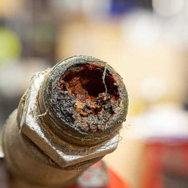 Corroded water line on older pipe fitting.