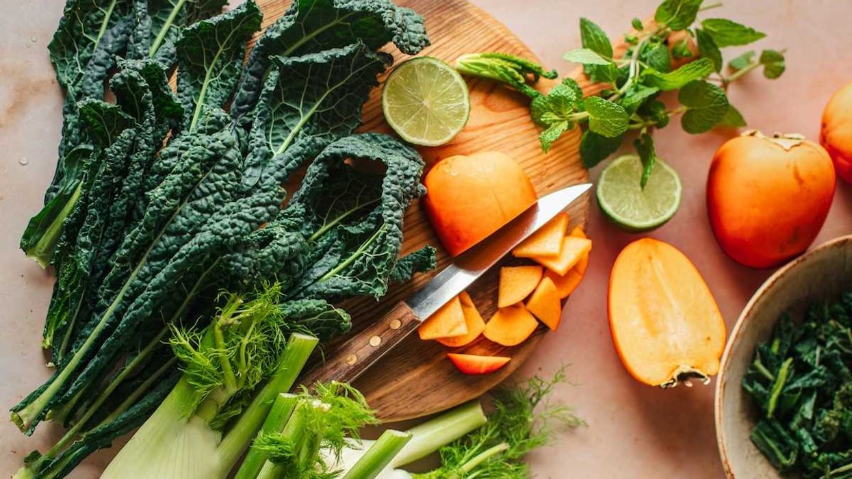 Cutting board adorned with fresh vegetables and fruit