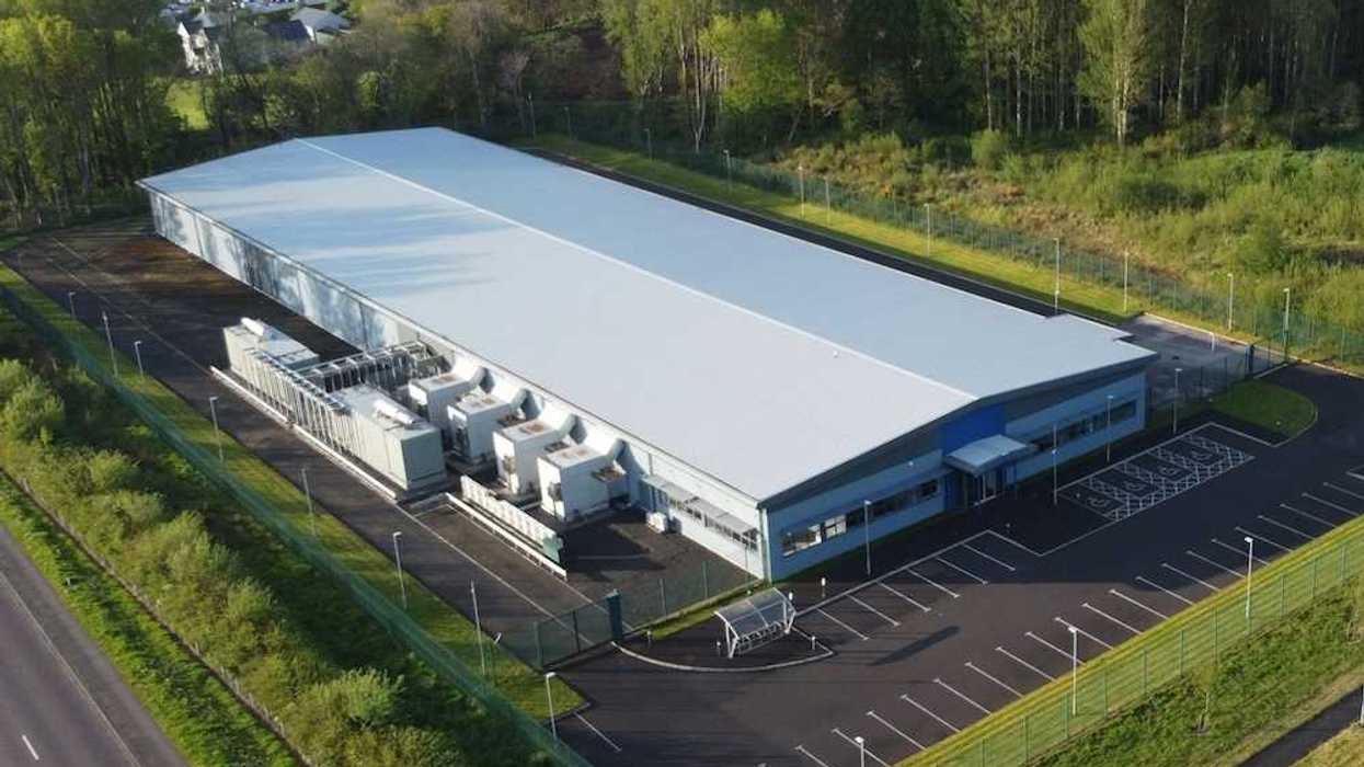 Data Center white industrial building in a green, bucolic rural setting