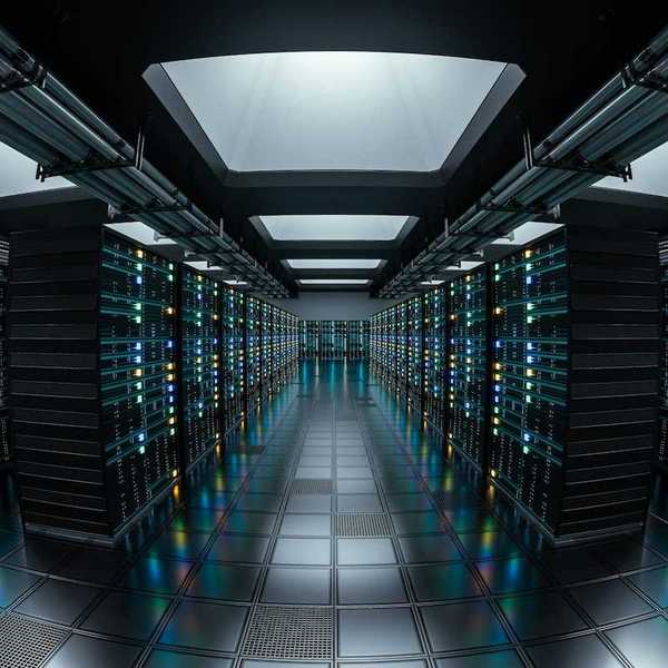 Data repository depicted by a long corridor lined with racks of tech