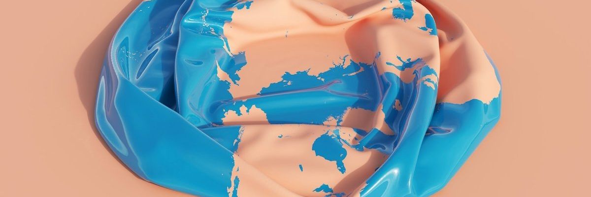 Deflated "earth" plastic beachball .