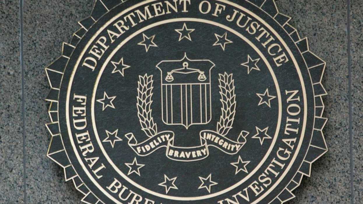 Department of Justice/FBI sign with DOJ seal "Fidelity, Bravery, Integrity"