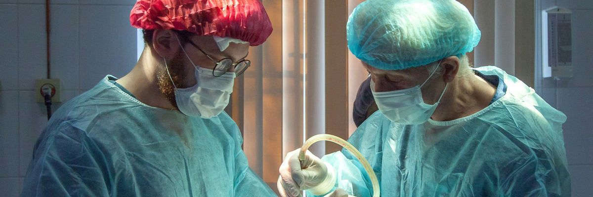 Doctors perform surgery